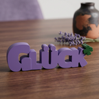 Glück – Stilvoller Deko-Schriftzug mit Kleeblatt