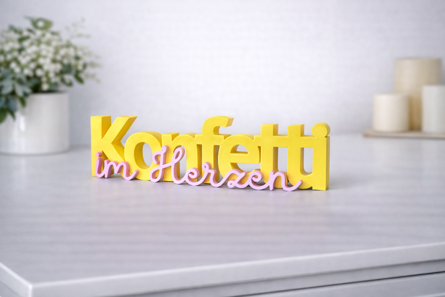 Konfetti im Herzen Schriftzug